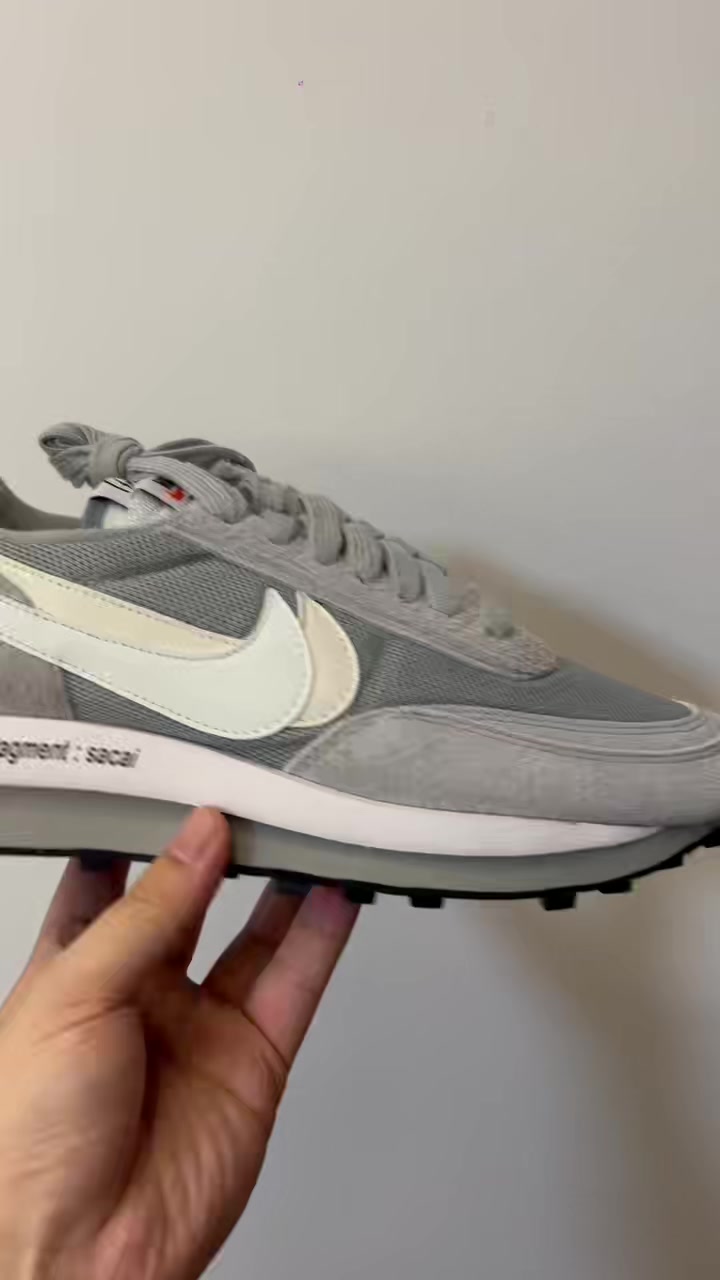 QC Sacai